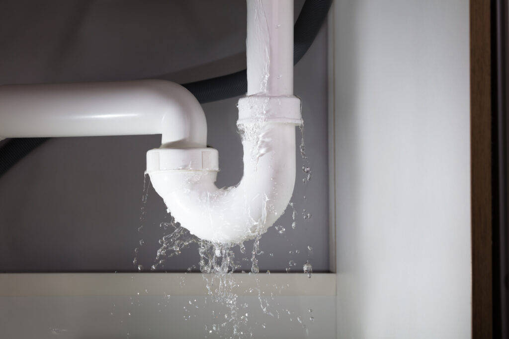 water leaking from ptrap under sink in a dallas home needing pluming repair services