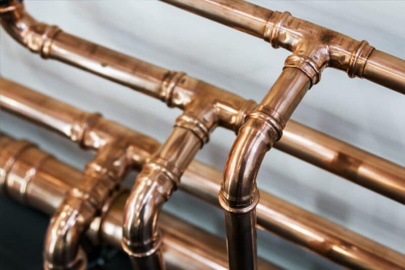 four rows of shiny new piping