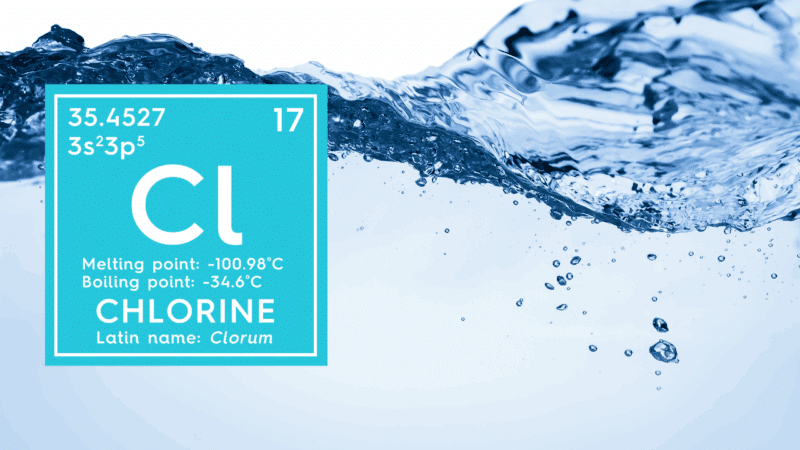 The atomic symbol for chlorine with a graphic of water filled in a glass in the background.
